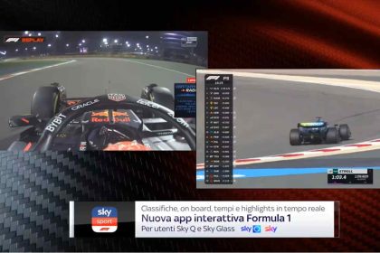 Ücretsiz F1 yayınları logosu, tehlike işareti ile birleştirilmiş.