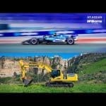 Komatsu reklamında Williams F1 aracı, pistte hızla ilerliyor.