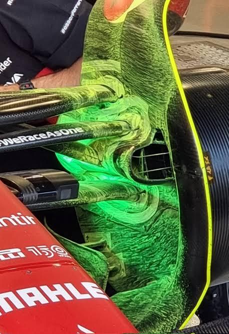 Ferrari F1-75 flow viz neon yeşil boya ön kanat endplate bargeboard yakın çekim WeRaceAsOne MAHLE 2022