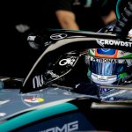 Mercedes AMG F1 sürücüsü kokpit içi portre Petronas kask halo CrowdStrike WhatsApp G42 sponsor 2026