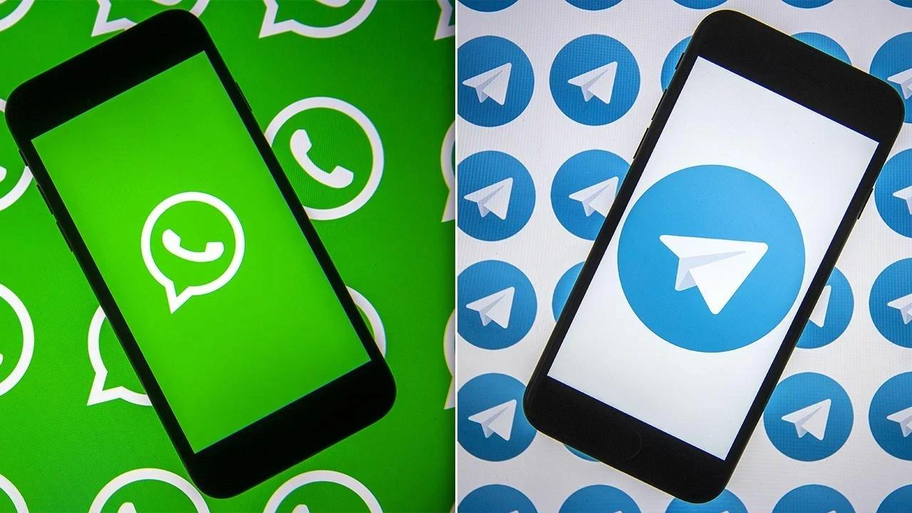 WhatsApp ve Telegram logoları telefonda — GüçlüF1 kanallarına katıl